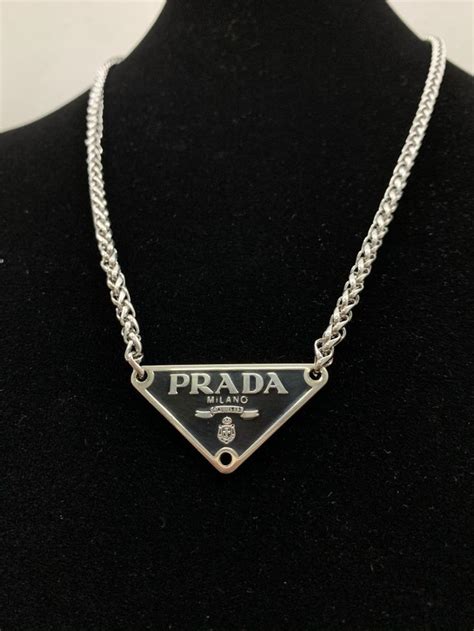 prada silver tag necklace|Prada necklace triangle dupe.